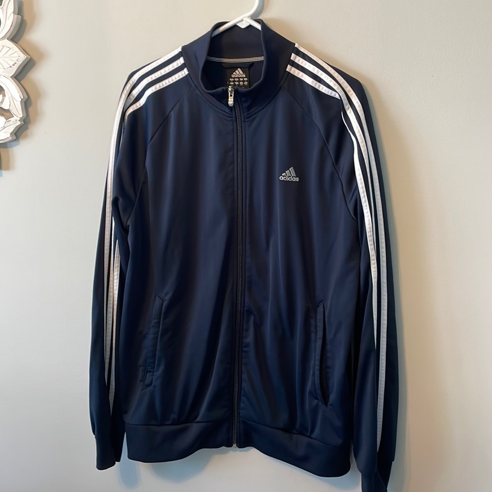 Adidas. Zip up. Blue with white stripes on the arms. Large.